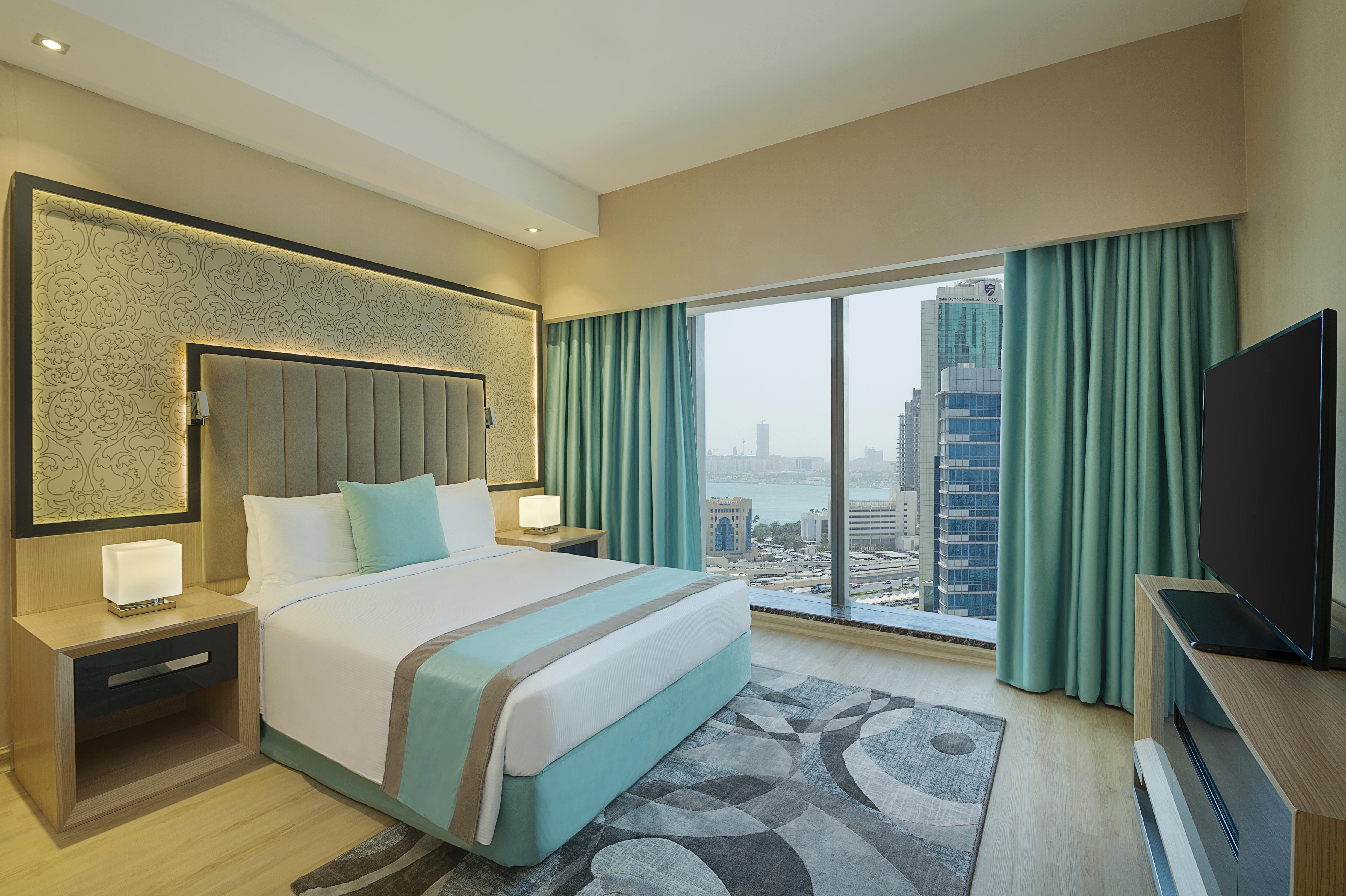 Wyndham Doha West Bay Hotel Exterior foto A bedroom at the hotel