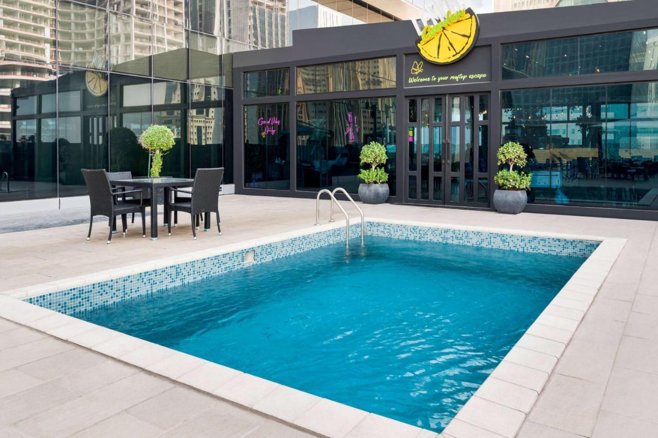 Wyndham Doha West Bay Hotel Exterior foto The Lemon Pool