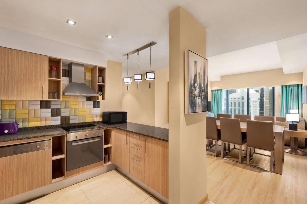 Wyndham Doha West Bay Hotel Exterior foto A typical apartment interior